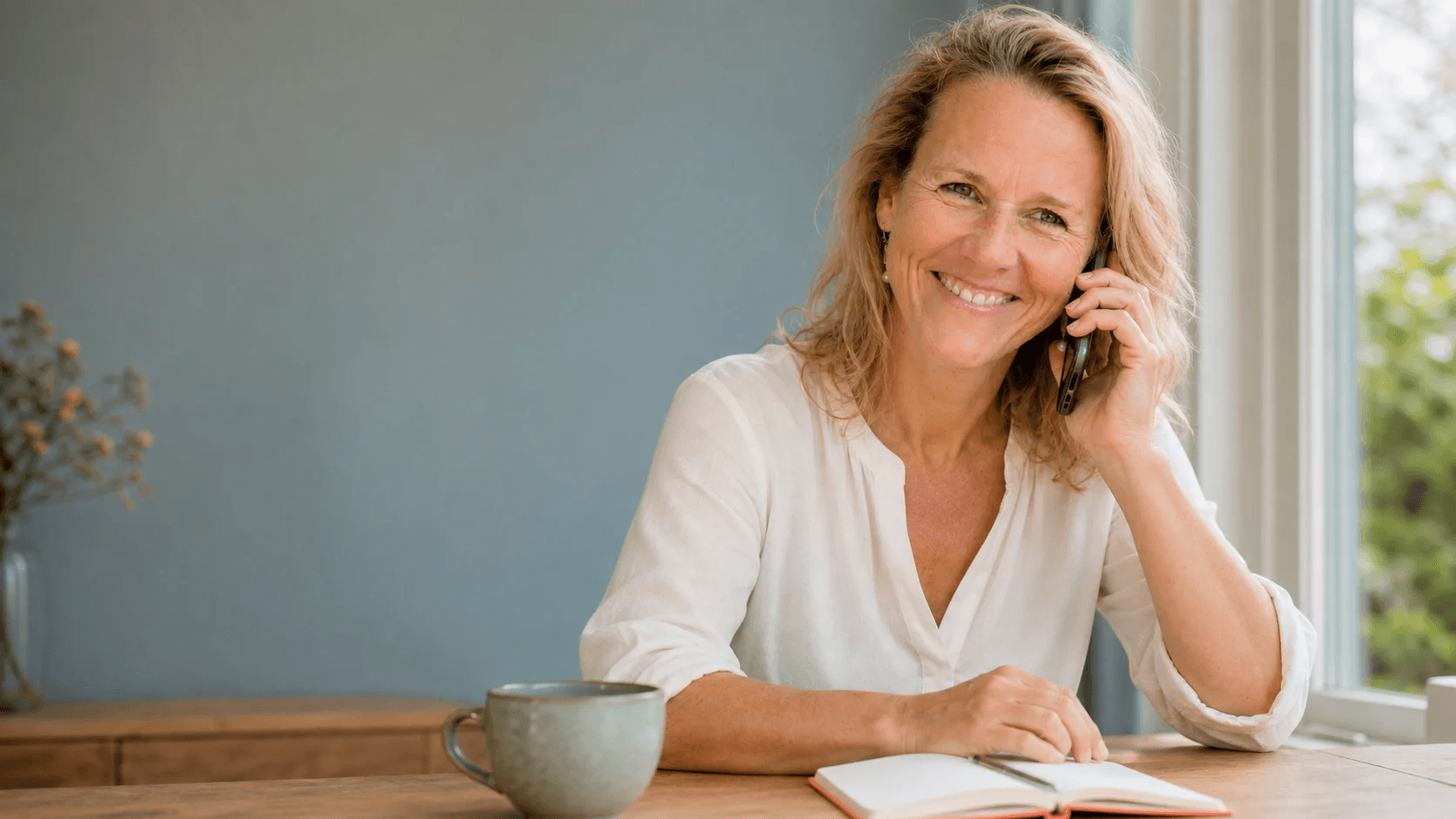 Astrid Sanders voert persoonlijk een telefonisch kennismakingsgesprek